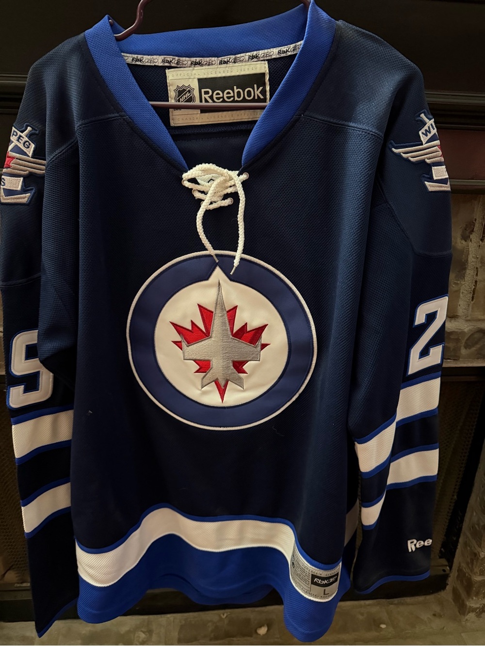 Reebok Men's Winnipeg Jets Navy Lace-Up Hockey Jersey